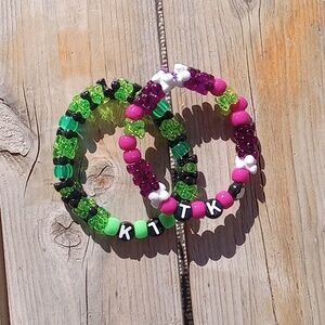 Handmade Demon slayer themed matching bracelets.